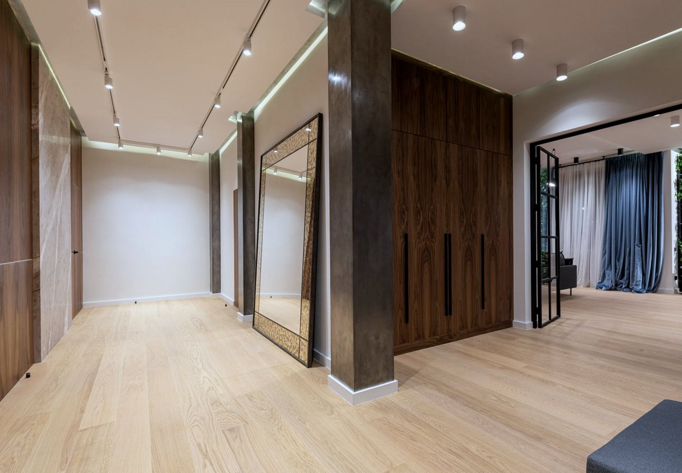 Newly laid oak wood flooring running through a hallway
